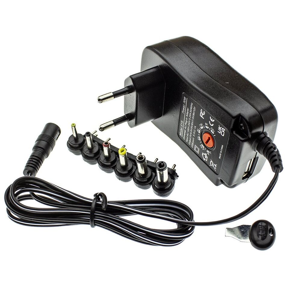 Мережевий зарядний пристрій універсальний з перем. SY8 30W 7 режимів + USB 5V 2.1A с 6 перехідниками Мережевий зарядний пристрій універсальний з перем. SY8 30W 7 режимів + USB 5V 2.1A с 6 перехідниками