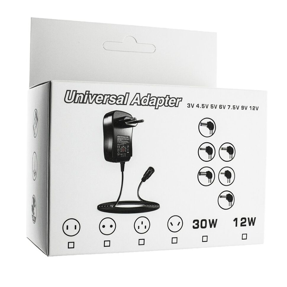 Мережевий зарядний пристрій універсальний з перемикачем SY6 12W 1,2A 7 режимів с 6 перехідниками Мережевий зарядний пристрій універсальний з перемикачем SY6 12W 1,2A 7 режимів с 6 перехідниками